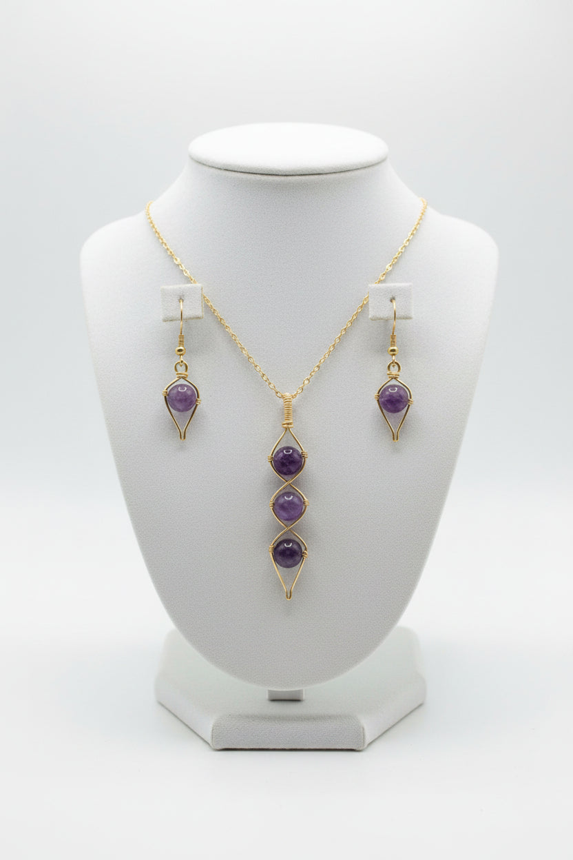 Amethyst pendant and matching earrings in gold
