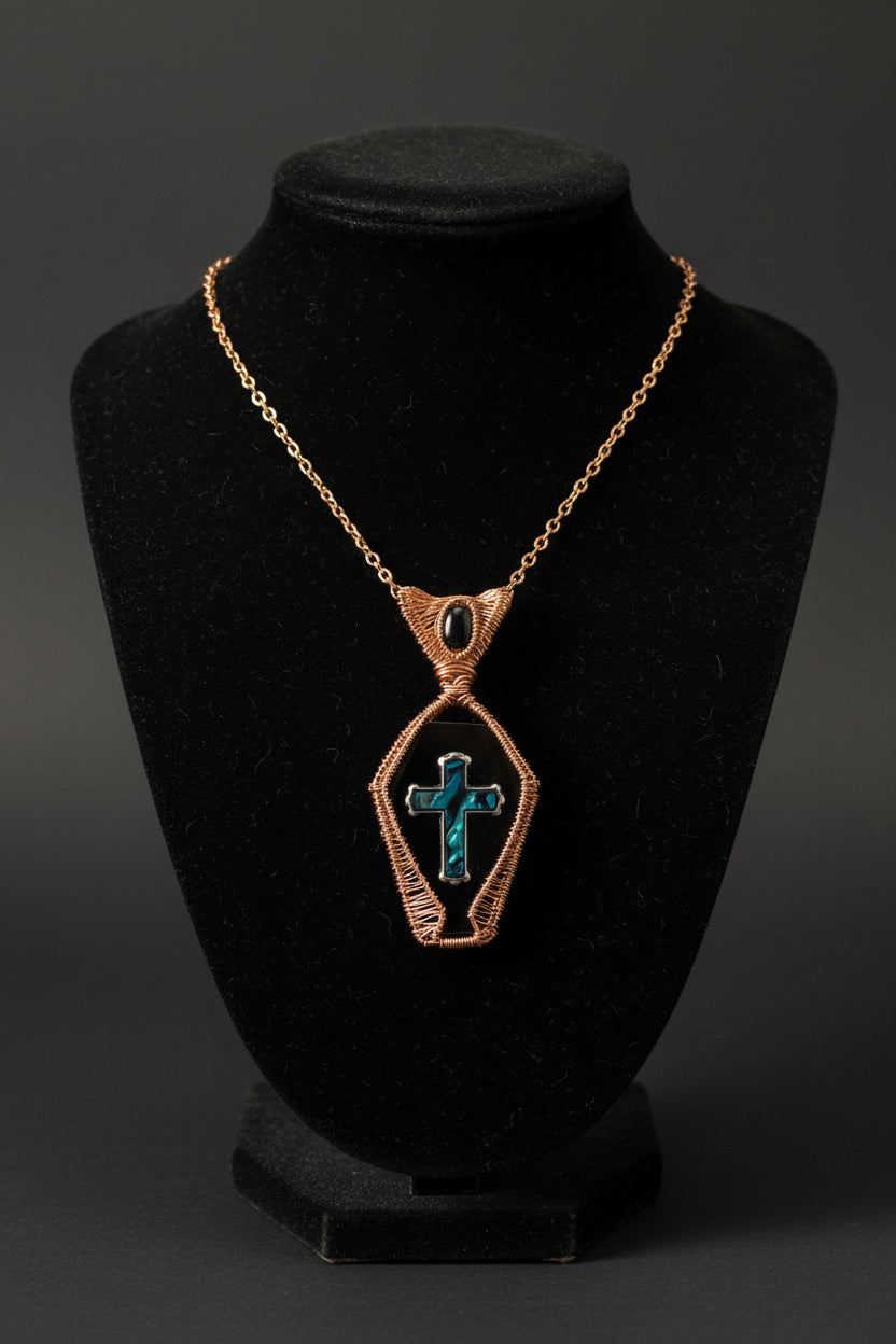 Copper wire wrapped Black onyx shaped coffin and abalone shell in silver copper