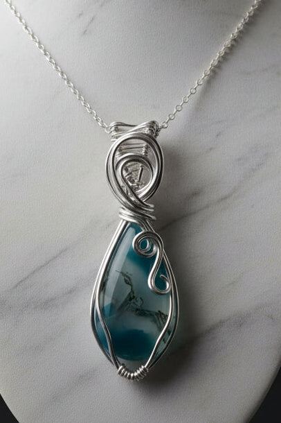 Moss agate in a silver