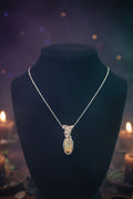 Genuine Opal wrapped in silver plated wire.