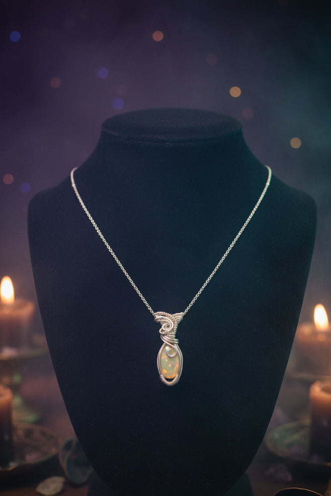 Genuine Opal wrapped in silver plated wire.