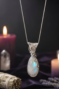 Rainbow moonstone wrapped- silver plated
