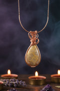 Copper wire wrapped corral fossil