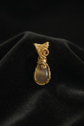 White chalcedony wirewrapped pendant in gold tone