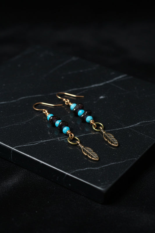 Garnet and turquoise earrings with a feather charm